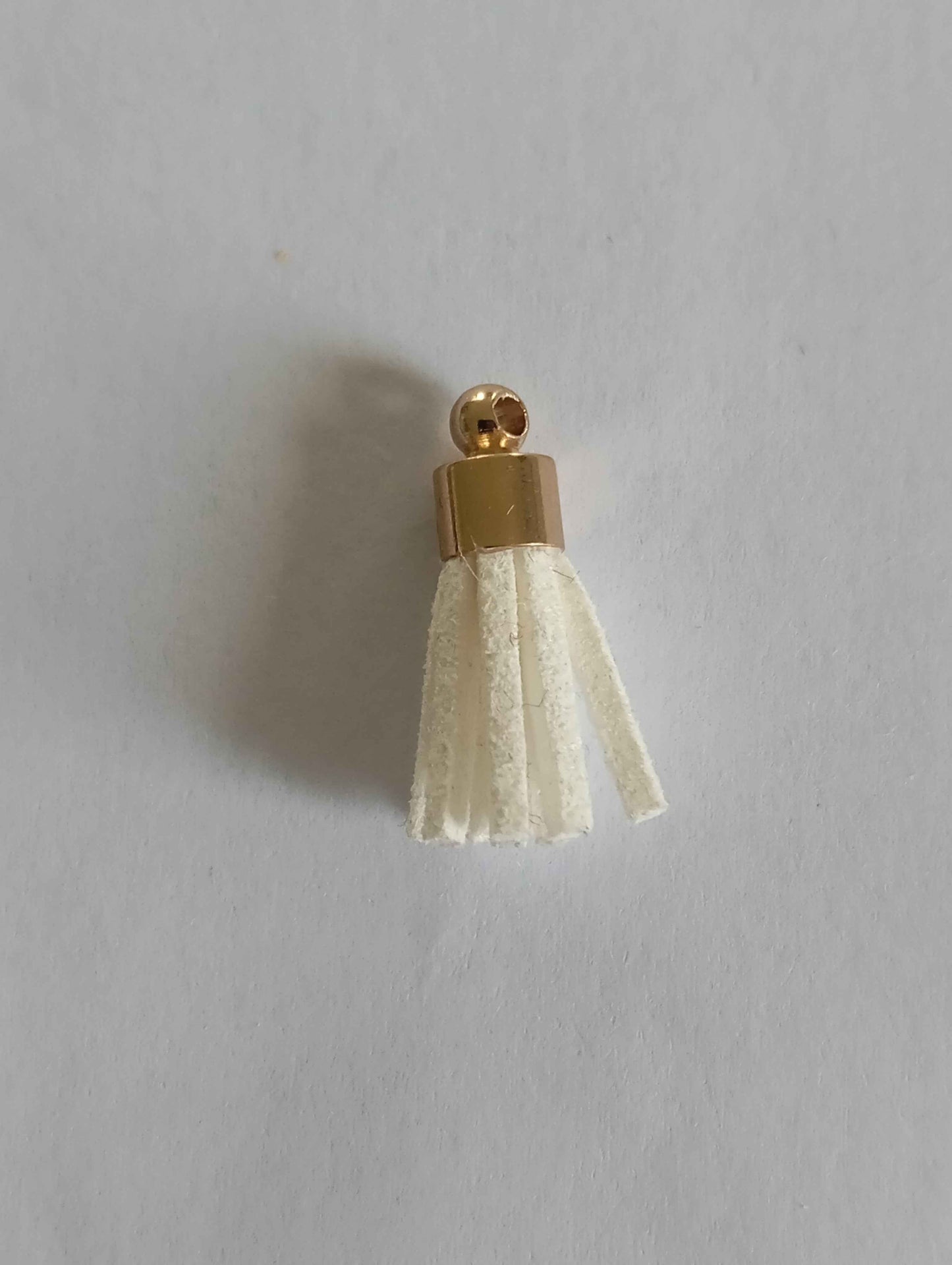 Charm pompon blanc